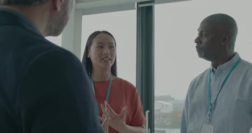 Group of Colleagues Meeting in an Office Building