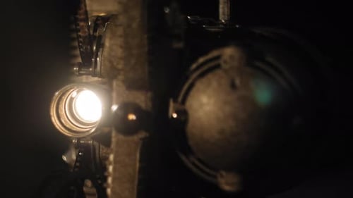 Vintage Film Projector Light in the Dark