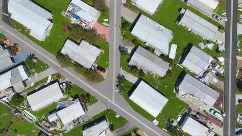 Severely Damaged Houses After Hurricane Ian in Florida Mobile Home Residential Area