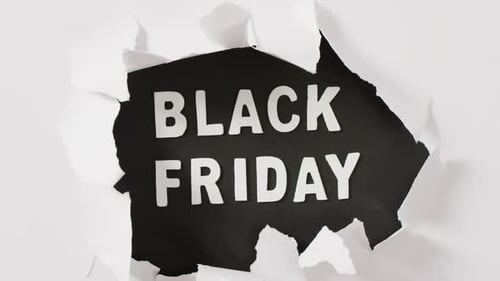 Black Friday Revealed Behind Torn White Paper