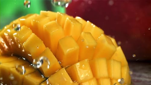 Raindrops Fall on Fresh Mango Filmed on a Highspeed Camera at 1000 Fps