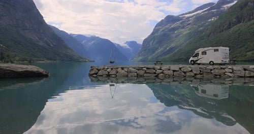 Family vacation travel RV, holiday trip in motorhome. Beautiful Nature Norway natural landscape.