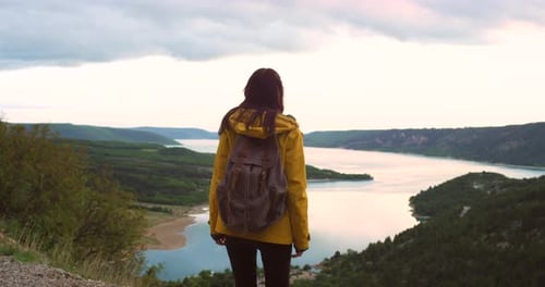 4k video footage of a female celebrating on a mountain top