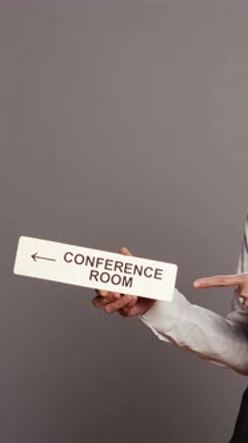 Directing to a Conference Room with Sign