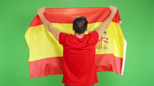 Man Holding Spanish Flag on Green Screen