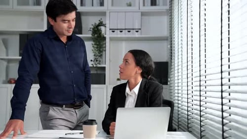 Business Colleagues Working Together in Modern Office