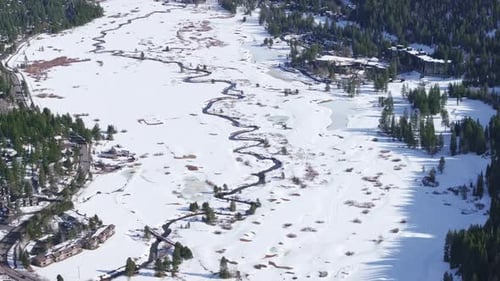 Aerial View of Snowy Ski Slope With Tracks at Palisades Tahoe Mountain