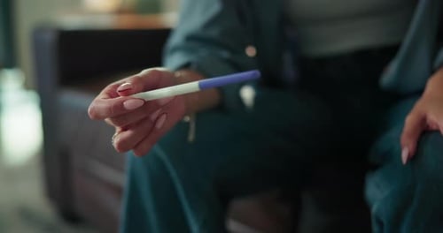 Hands, woman or waiting with pregnancy test in home for IVF treatment, infertility risk or nervous
