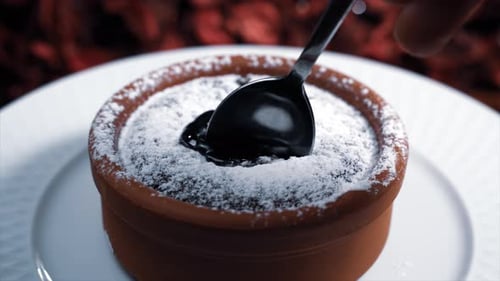 Hot Chocolate souffle. souffle presentation chocolate dessert fiery.