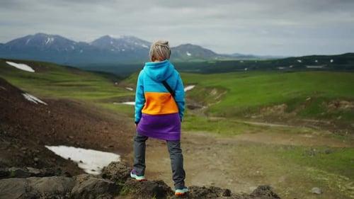 Adventure In Mountains Rear View Of Inspired Woman Traveler Enjoying Beautiful View From Mount Top