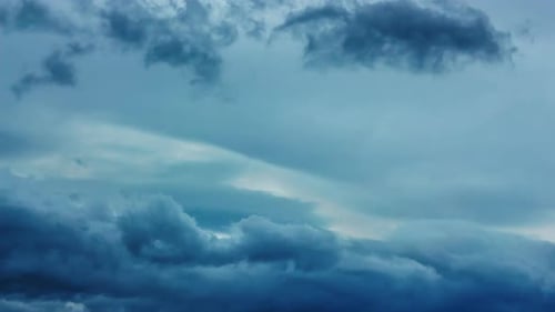 Majestic Clouds Moving in a Dramatic Evening Sky