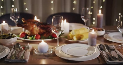 Thanksgiving Holiday Table with Turkey in the Center of the Table