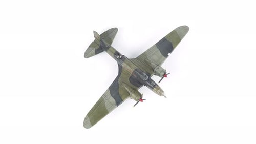 Scale Model Airplane on White Background Rotating