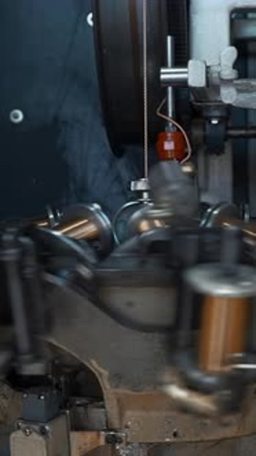 Automated Wire Winding Machine in Factory Setting