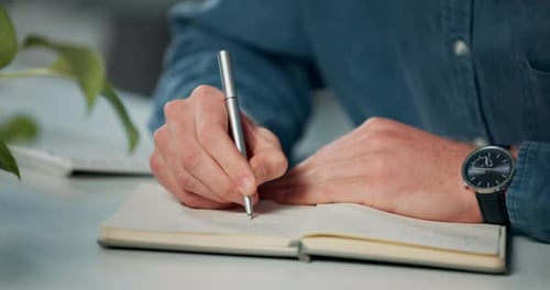 Person, pencil or writing in book on table for work, planning schedule or business appointment