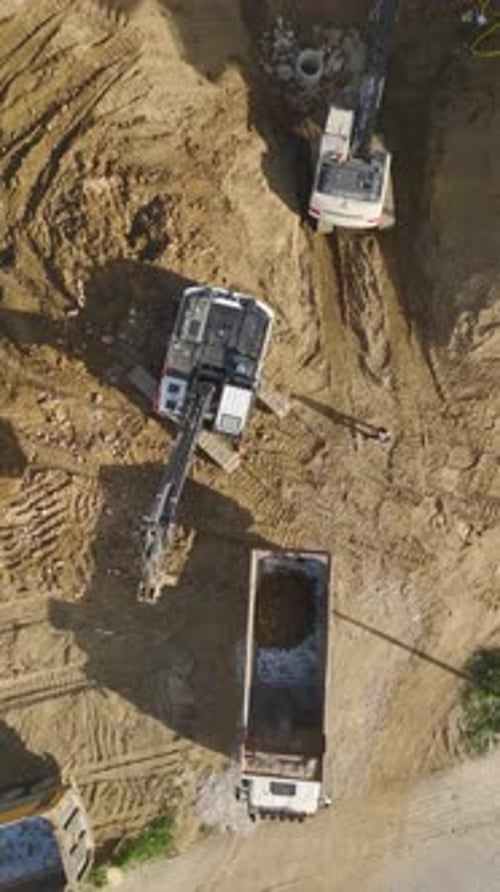 Vertical Video Foundation Preparation and Balcony Glass Work Progress Actively on a Large