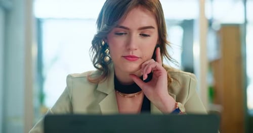 Office, thinking and woman at laptop with online research, review or web analysis for business plan