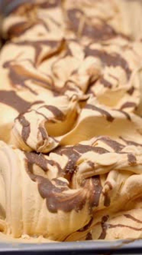 Creamy Caramel and Chocolate Ice Cream in Tray Frozen Ice Cream Concept