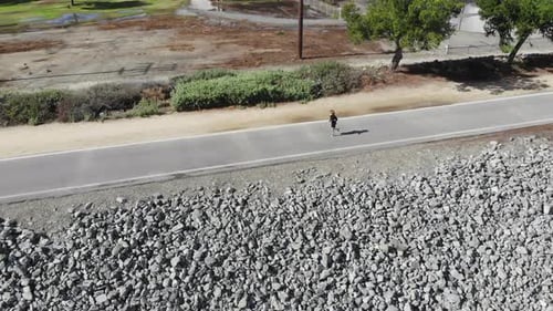Person Jogging on Path Aerial View
