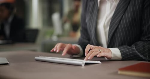Hands, computer and person typing for business research, networking and administration in office