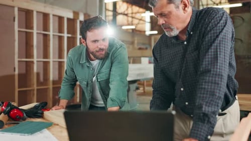 Teamwork, carpentry or people with laptop in warehouse for manufacturing