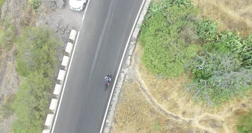 Bicycle chase in mountain road 76 4K