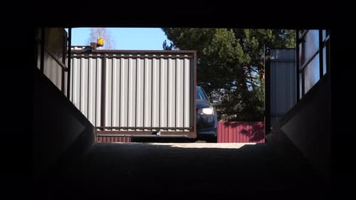 Automatic Rc Gates to the Garage Open and the Car Enters a Private Parking Space