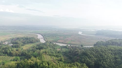 Panoramic High Angle View of Winding River Through Green Valley