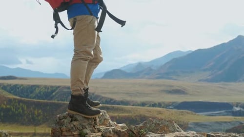 Hiker With Backpack Looking At Mountain Male with Bag at Wild Journey Climb Trek