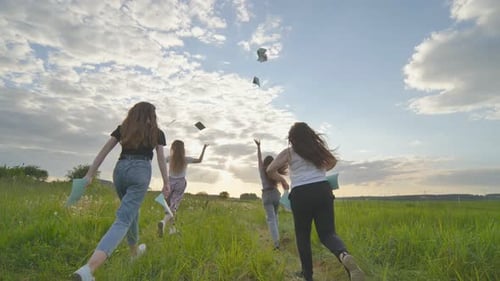 Cheerful Students Run Throwing Notebooks After School