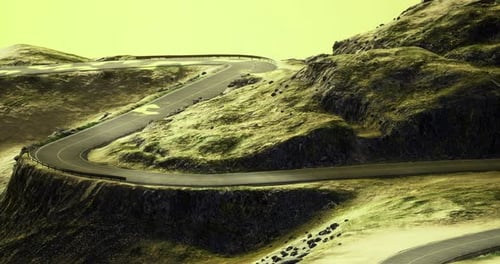 Winding Road Through Mountains Offers Stunning Views and Adventure for Drivers