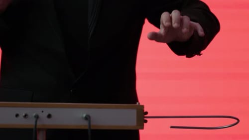 Man Playing Theremin Electronic Musical Instrument