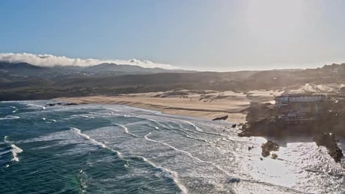 Sand beach surrounded by cliffs, Aerial Paradisiac beach holidays concept