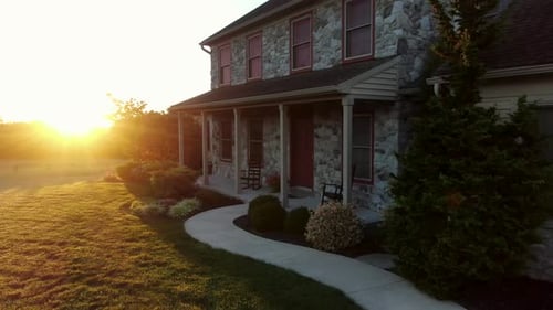 Stone House at Sunrise in a Rural Setting