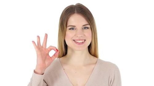 Smiling Woman Giving OK Hand Gesture