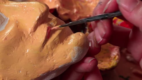 Close Up Hands Painting Mask