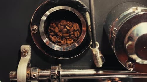 Roasted Coffee Beans Spinning in Roasting Machine