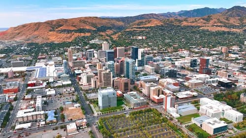 Modern urban landscape at the foot of the mountains of Salt Lake City, Utah, USA at day.