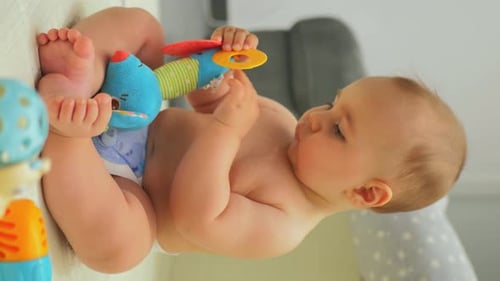 Baby Playing with Toys at Home