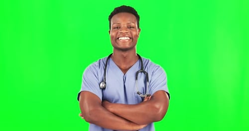 Black man, doctor on green screen and smile on face with arms crossed, mockup space and healthcare