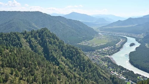 Katun River flowing among the mountains in the early morning