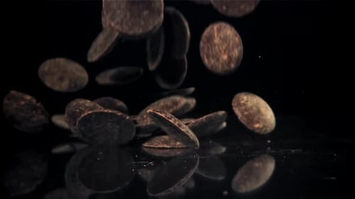 Dark Chocolate Chips Fly and Fall Filmed on a Highspeed Camera at 1000 Fps