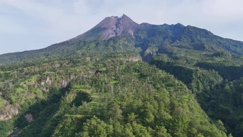 Majestic Merapi Volcano Lush Green Slopes and Dramatic Mountain Summit
