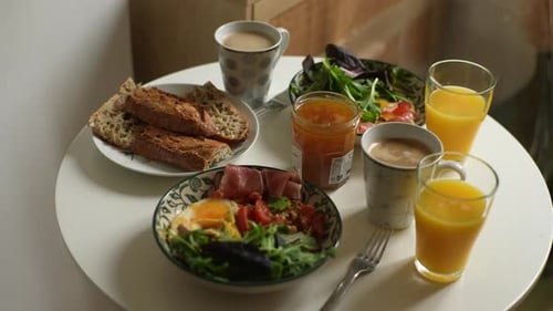Circle Tracking Shot of Table with Food and Drinks for Breakfast Dinner Lunch or Brunch Delicious