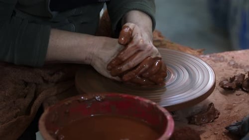 Working With Clay In Ceramic Workshop 24