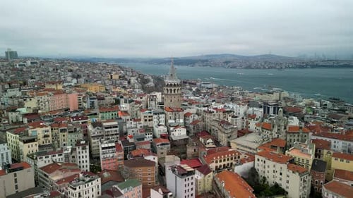 Circling the drone around the Galata Tower in Istanbul, the Bosphorus strait