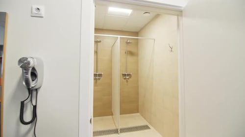 Shower Stalls in a Clean Public Bathroom