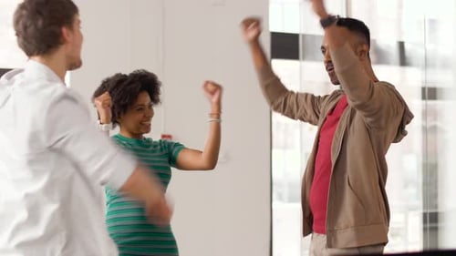 Diverse Team Celebrating Success with a High Five