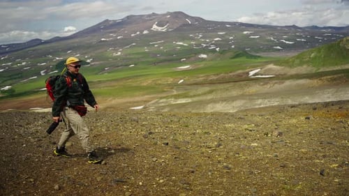 Mountaineering In Mountain Range Young Man Hiking On Trail Trekking And Backpacking
