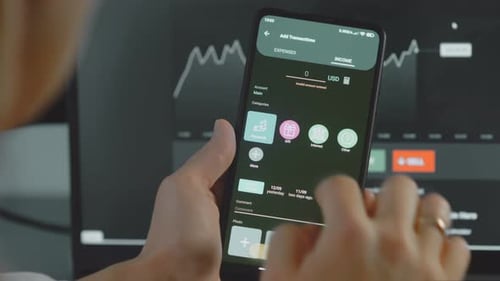 Using Budgeting App on Smartphone at Workplace